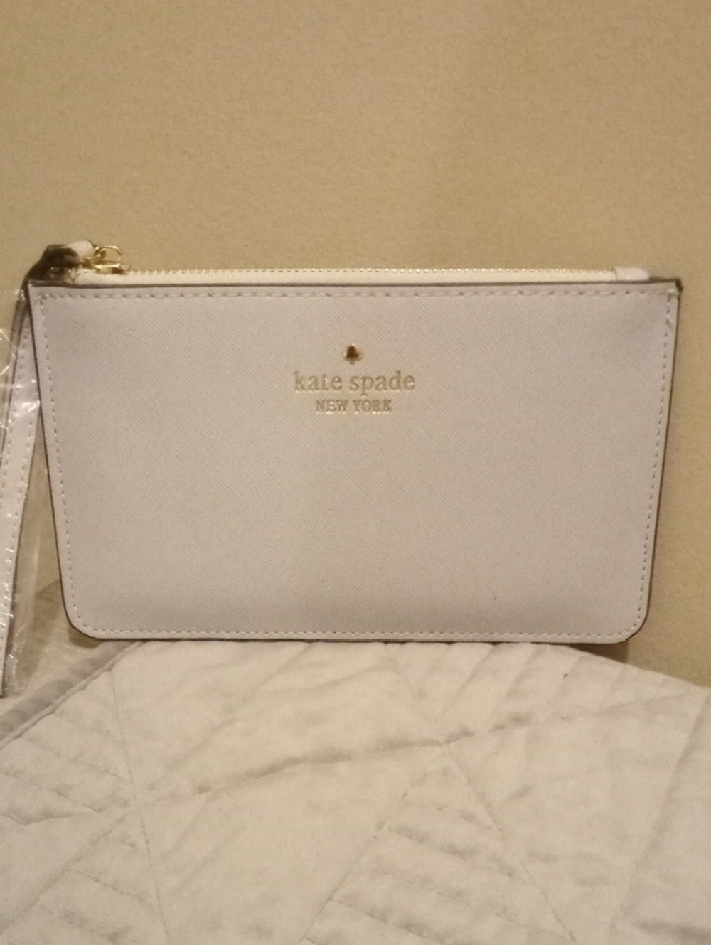kate spade White Lite Grey Saffiano Wristlet with Gold Logo